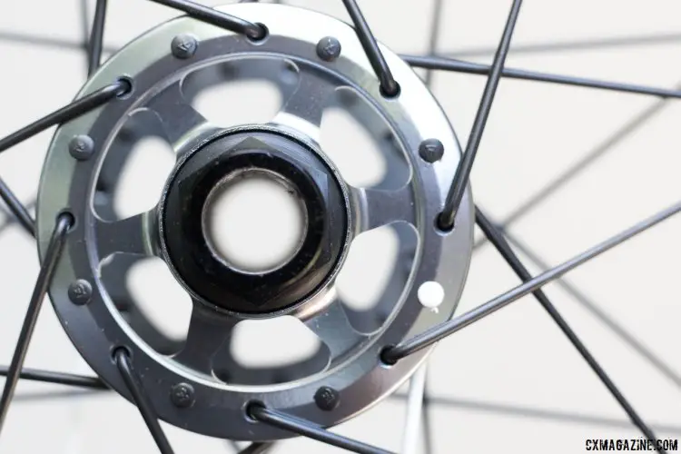 No caps to fall out here. Want to switch between QR and thru axle, you'll need a new $35 axle, but it's more secure and rigid and you won't lose a cap. American Classic MTB Race 29er tubeless wheels. © Cyclocross Magazine