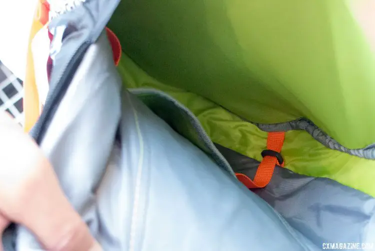 The hip belt's straps help pull the bladder closer to your back as you empty the reservoir. Camelbak, Press Camp 2016. © Cyclocross Magazine