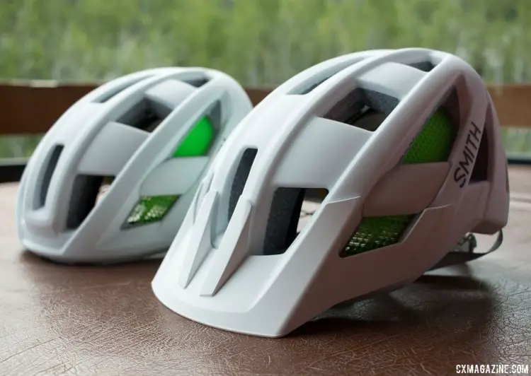 Smith's new Route (road, left) and Rover (mtb, right) helmets use different molds but look similar. The Rover has more coverage out back, and comes with a removeable visor. Press Camp 2016. © Cyclocross Magazine