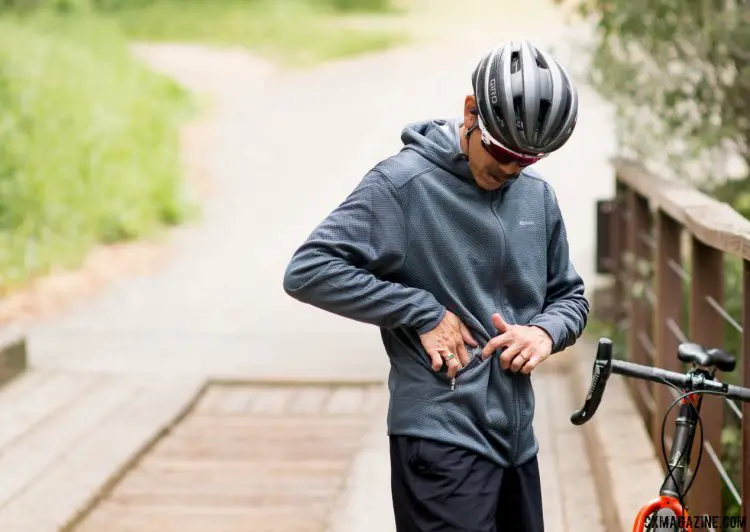 Not all the feature products are coming in the future. We've been enjoying the Ignite Aero Fleece hoodie on cool evenings and on morning commutes. For off-the-bike tunes, the collar secures headphone cords. © Cyclocross Magazine