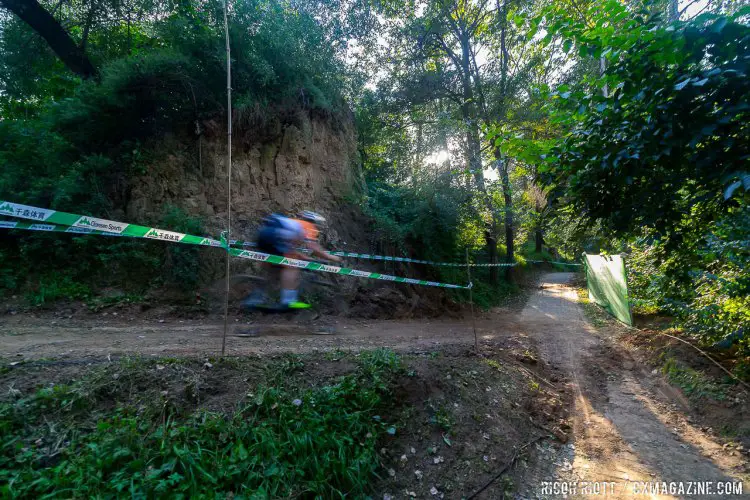 A couple of fast descents keep the pace high as the course returns back along the river banks in Yanqing @ R. Riott / Cyclocross Magazine