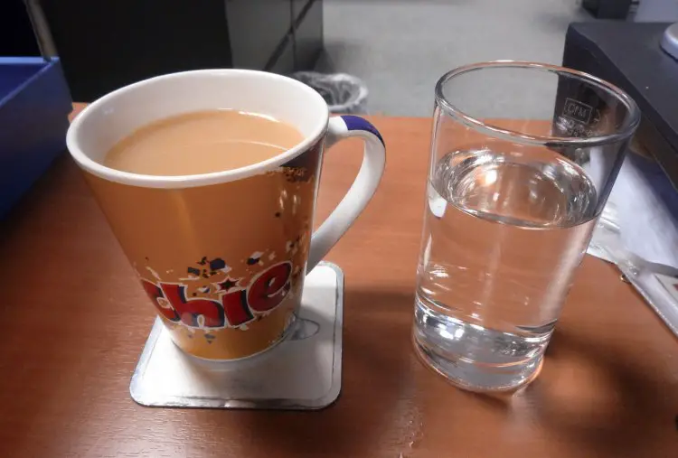 Drink the water before the coffee to ensure proper hydration, especially after a night of sleep with the heater on. Training Tuesday: Focusing on Rest and Recovery. photo: Ambernectar 13