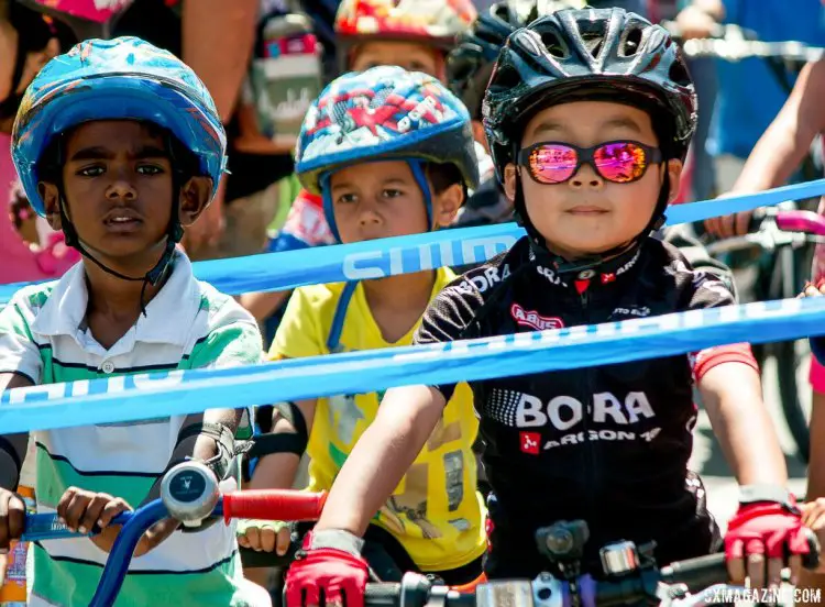 Julbo's youth sunglasses protect the precious eyes of little ones, and help with the start line game face. © Cyclocross Magazine