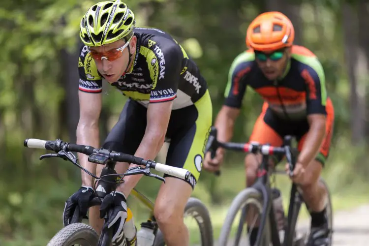 Jeremiah Bishop getting into a creative aero position. Jared Nieters following. Photo: Bruce Buckley