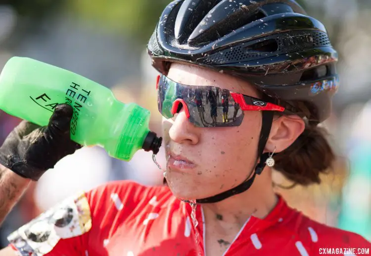 Sofia Gomez Villafane doing her best to hydrate and get some water inside, but some spilled on her jersey helps her cool down after the 2016 Jingle Cross World Cup. © A. Yee / Cyclocross Magazine