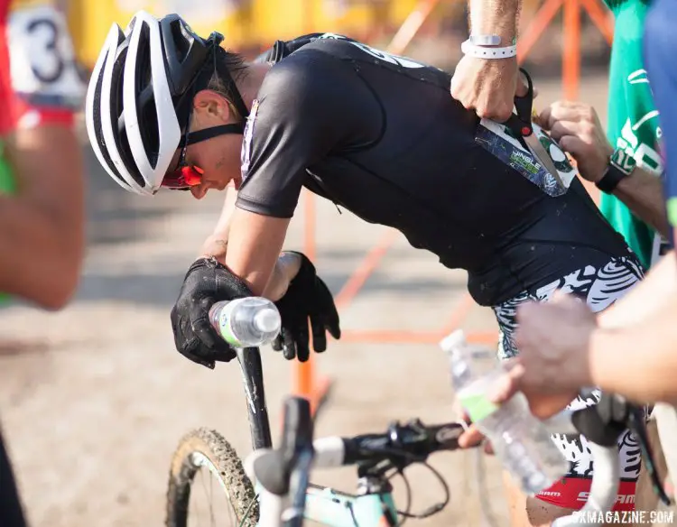 The 2016 Jingle Cross World Cup promoters had bottles ready at the finish, and Emily Kachorek was sure to grab one after the humidity and heat on Saturday. Elite Women. © A. Yee / Cyclocross Magazine