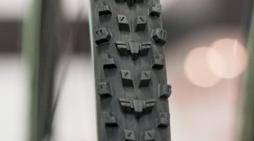 The new Maxxis All Terrane looks like an aggro Grifo, with tall, squared-off knobs. 60 and 120 tpi options, 395 and 375 grams. Tubeless with a carbon bead. Maxxis cyclocross and gravel tires. Interbike 2016 © Cyclocross Magazine