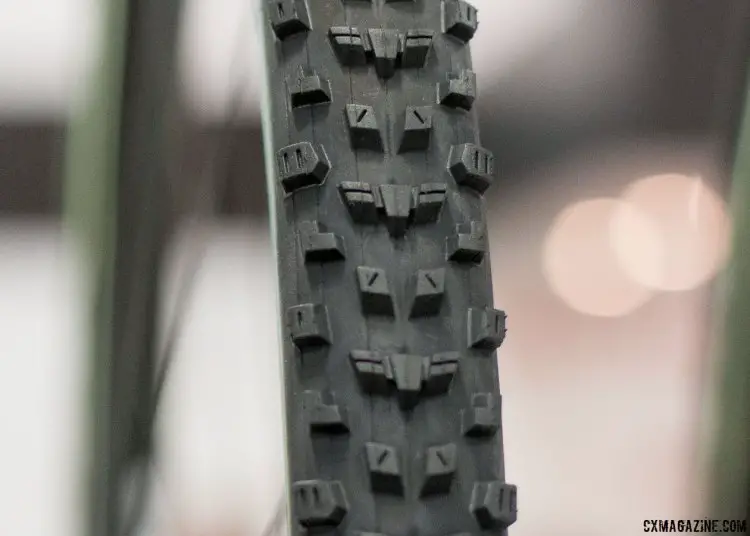 The new Maxxis All Terrane looks like an aggro Grifo, with tall, squared-off knobs. 60 and 120 tpi options, 395 and 375 grams. Tubeless with a carbon bead. Maxxis cyclocross and gravel tires. Interbike 2016 © Cyclocross Magazine