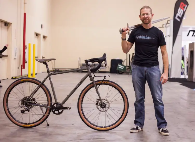 Rawland cofounder Sean Virnig poses by the new RAVN all-road enduro bike on the showroom floor at Interbike 2016. © Cyclocross Magazine