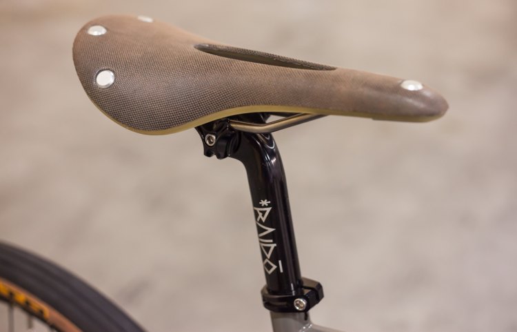 The stock build comes with a Brooks Cambium C15 Carved saddle perched atop a zero-offset Raidoverks seatpost. © Cyclocross Magazine