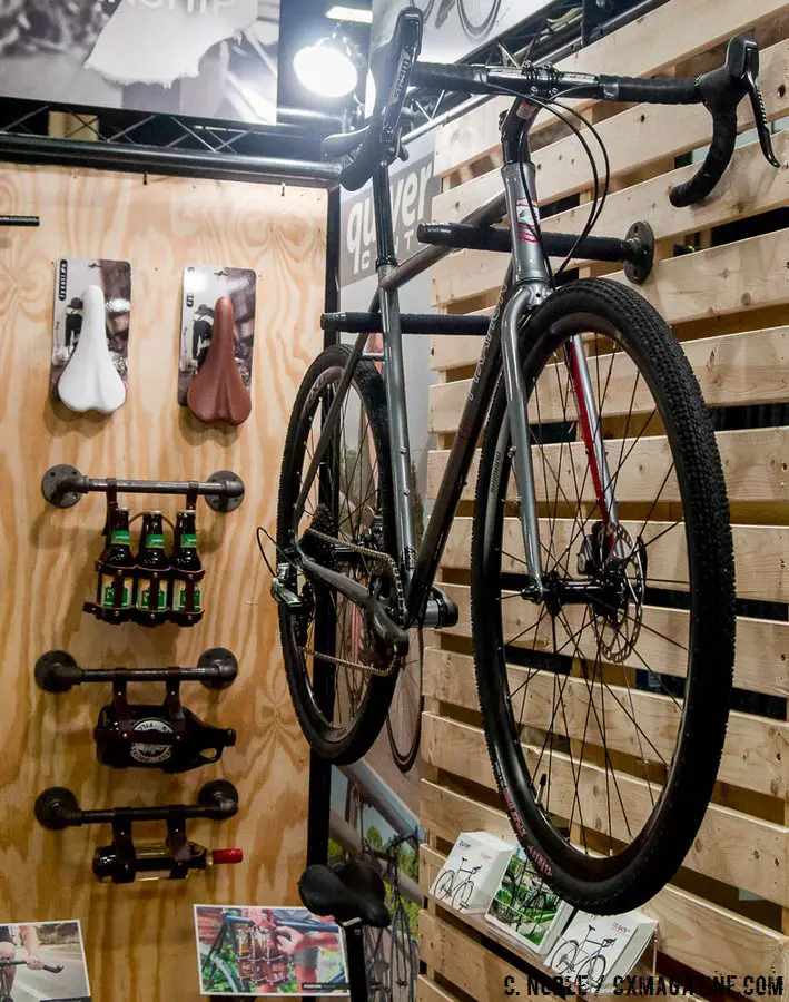 The Fyxation Quiver disc cyclocross bike caught our eye, but so did those handlebar beverage holders seen in the background. Hydration is important. Interbike 2016 © C. Noble / Cyclocross Magazine