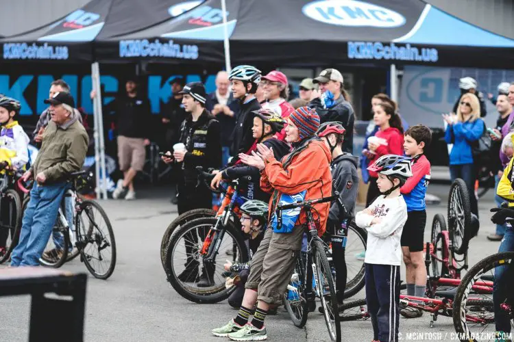 A crowd forms to cheer on a trials rider doing stunts. 2016 KMC Cross Fest Day 2. © Chris McIntosh / Cyclocross Magazine