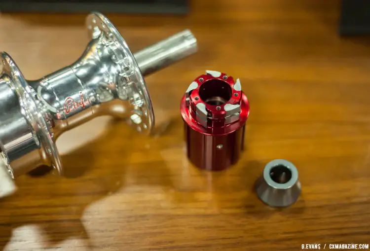 Tool-free disassembly makes for easy access when servicing the pawls and bearings. Available in “Classic” and “Pro” models, the latter (pictured here) shaves weight by swapping stainless steel for aluminum in the axle, end caps and freehub body. © Cyclocross Magazine