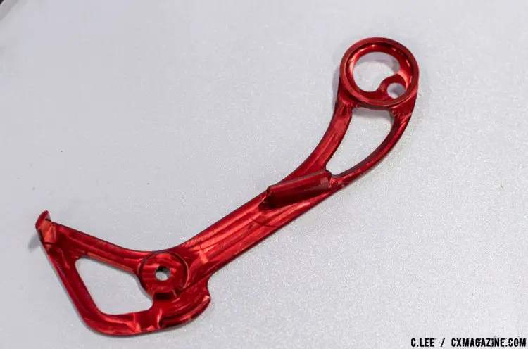 Machined WolfCage for shimano is an inner derailleur pulley cage that allows Shimano XT and XTR to handle the GC 49t cog. © Cliff Lee