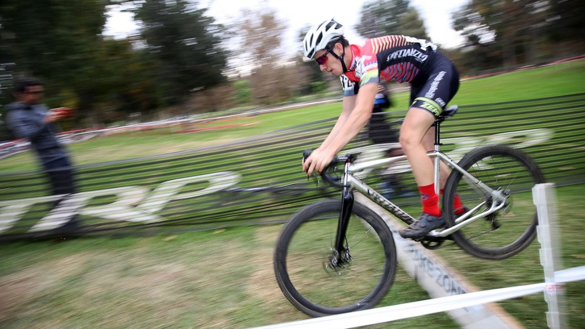 Ben Gomez Villafane lives up to his name "Benny hops" and hops the barrier. 2016 CXLA Day 2. © Cathy Fegan-Kim / Cyclocross Magazine