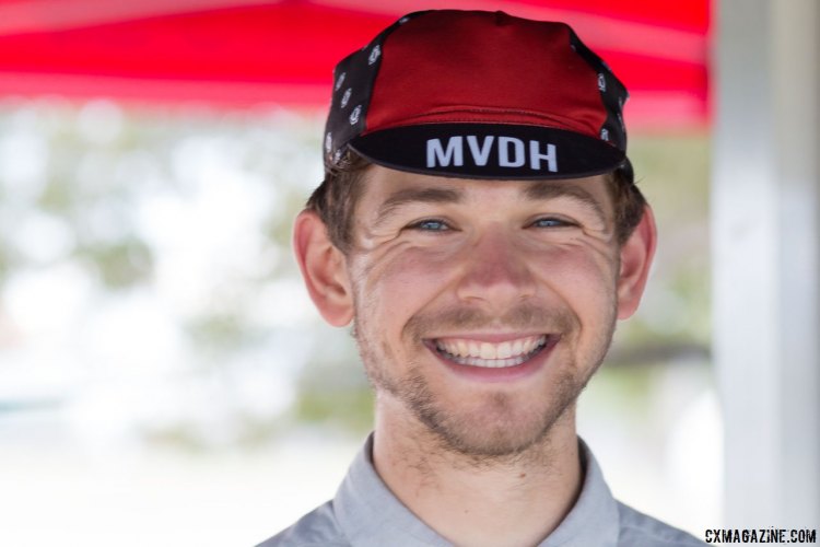 Michael Van den Ham is all smiles modeling his cap. You can own one too, as it's one way he funds his European race travel. © Cyclocross Magazine