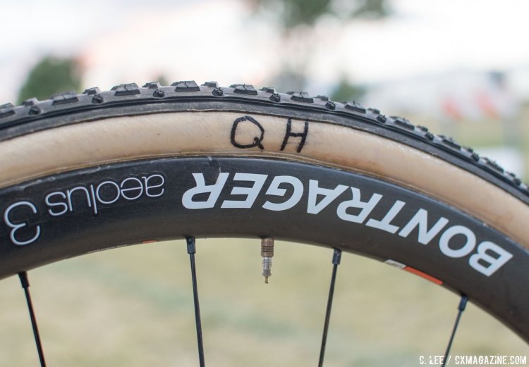 Quinten Hermans' Trek Boone cyclocross bike features the same wheels as his teammates, but the tires and tire markings make it easy to keep his wheels from getting mixed up with others. © C. Lee / Cyclocross Magazine