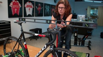 No matter how long you've been racing, a bike fit can be invaluable in addressing physical issues or adapting to a new bike, or aging body. photo: Specialized's Julie Bates helps dial in a bike fit. © Cyclocross Magazine