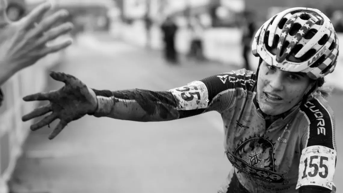 Katie Clouse offers a fan a muddy but victorious high five after a hard-fought win. A look back at the 2016 Cyclocross Nationals' final day. © A. Yee / Cyclocross Magazine