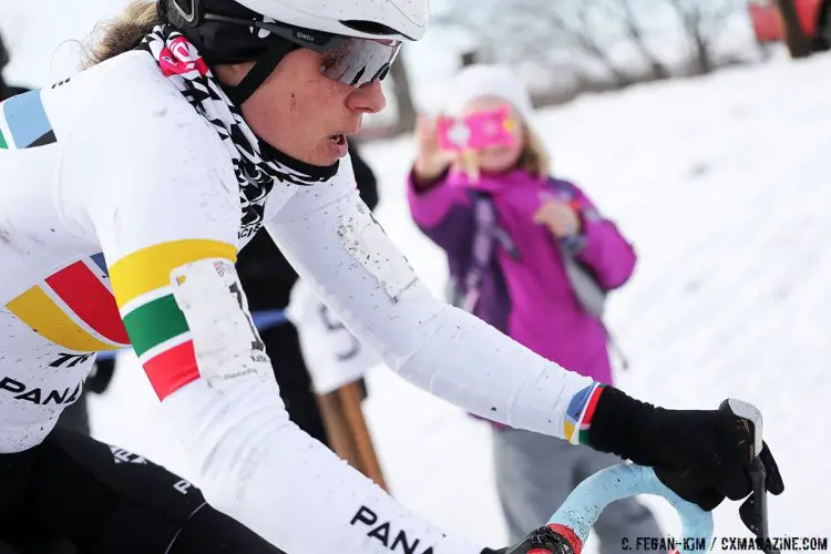 A little girl with a pink phone and a big smile snaps a photo of Katie Compton as she flies by. 2017 Cyclocross National Championship, Elite Women. © C. Fegan-Kim / Cyclocross Magazine