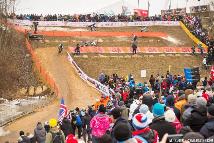 The off-camber downhill had an element of Jingle Cross to it, although the ground was frozen. 2017 UCI Cyclocross World Championships, Bieles, Luxembourg. © M. Hilger / Cyclocross Magazine