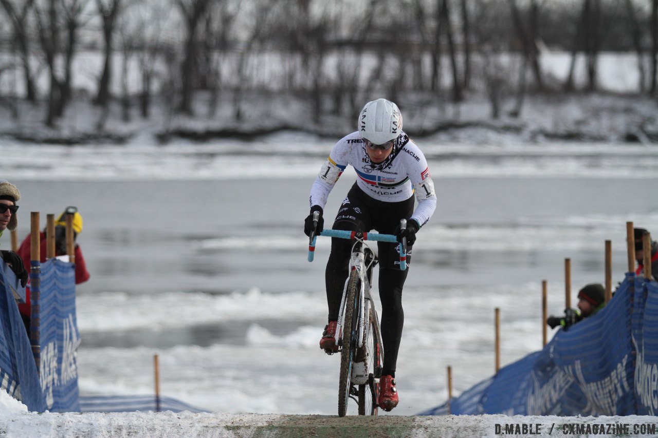 Katie Compton charges the mini-flyover as the nearly-frozen Connecticut River flows slowly behind. 2017 Cyclocross National Championships © D. Mable / Cyclocross Magazine