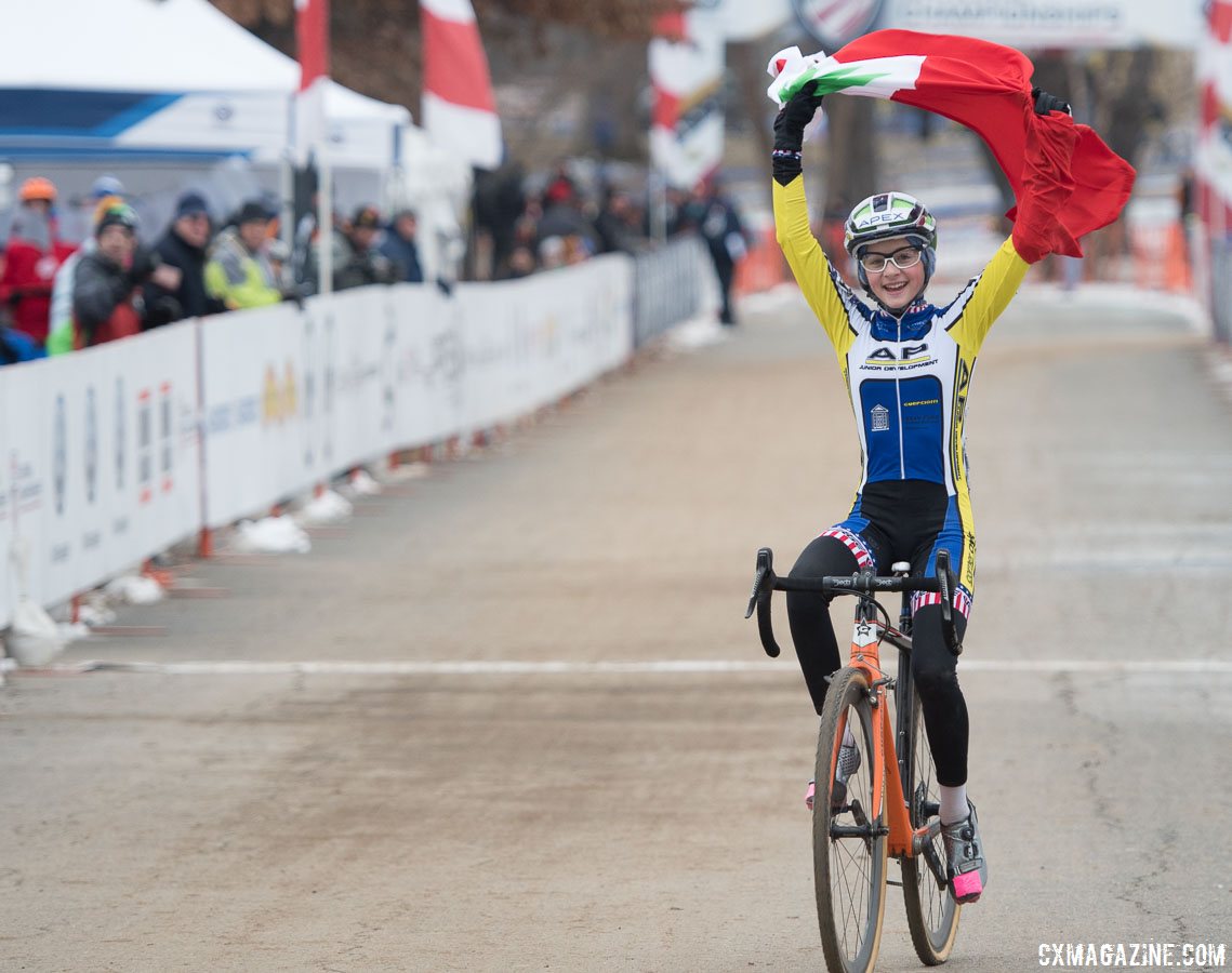 Lizzy Gunsalus appropriately hoists the New England flag after winning the Junior Women's 13-14 National Championship in Hartford. 2017 Cyclocross National Championships, Junior Women 13-14. © A. Yee / Cyclocross Magazine