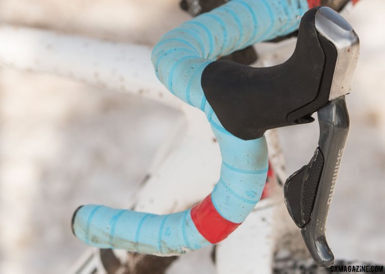 Red electrical tape provides some championship stripes to the bars, but one side was simply to cover up a tear caused by a collision with a post during pre-ride, and the other side is to match and provide visual balance. © Cyclocross Magazine