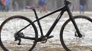 Musgrave's bike has a decidely stealth look with the matte black, plain carbon finish but it features nice red highlights here and there like the skewers, chain, grips, headset spacers and spoke nipples. 2017 Cyclocross National Championships. © A. Yee / Cyclocross Magazine