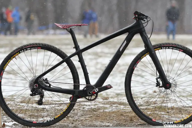 Musgrave's bike has a decidely stealth look with the matte black, plain carbon finish but it features nice red highlights here and there like the skewers, chain, grips, headset spacers and spoke nipples. 2017 Cyclocross National Championships. © A. Yee / Cyclocross Magazine