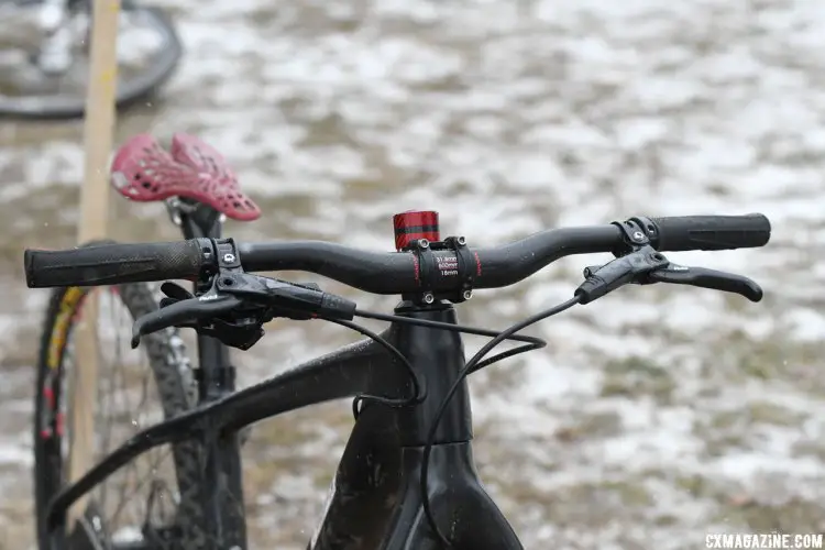 For smaller riders, handlebars that are flat or near flat help keep the front end from getting too tall. The low rise carbon bar shown here appears to be a non-marquee brand. 2017 Cyclocross National Championships. © A. Yee / Cyclocross Magazine