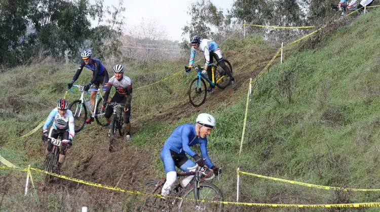 Cyclocross legend and champion John Elgart leads the B field down the course's one prominent hill. Rockville Bike Cyclocross Series, Solano Community College. © John Silva