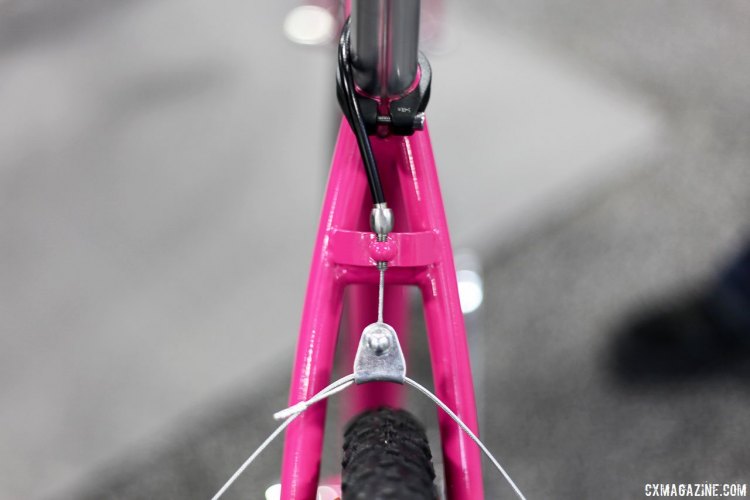 Dean Bikes' hot pink cyclocross singlespeed reminds us of the coveted pink Stumpjumper Team from 30 years ago, but the brakes are on the seatstays, not under the chainstays. NAHBS 2017. © C. Fegan-Kim / Cyclocross Magazine