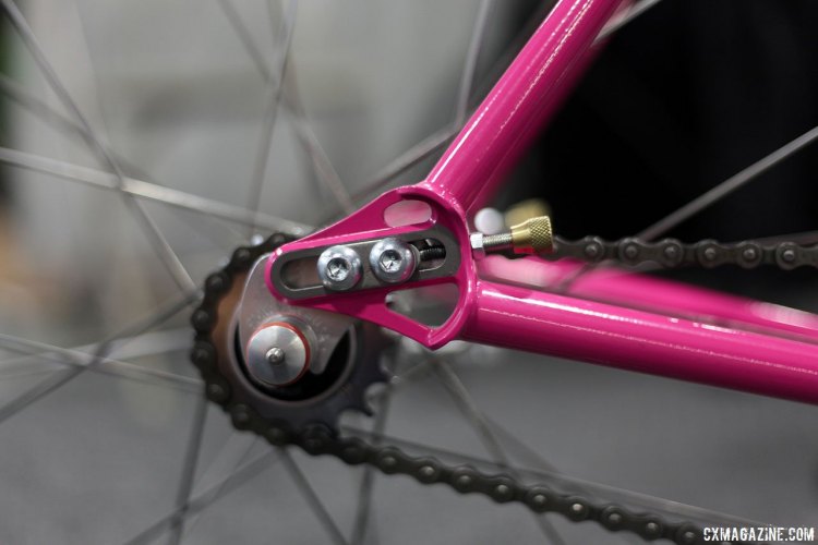 Dean Bikes' hot pink singlespeed features Paragon Machine Works sliding dropouts, and a rear derailleur hanger can be added. NAHBS 2017. © C. Fegan-Kim / Cyclocross Magazine