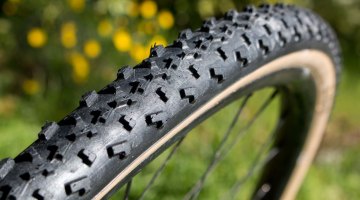With tan sidewalls, a relatively supple 185 tpi casing and aggressive tread, riding buddies and competitors might think you're on a new handmade mud tubular. Islabikes Gréim Pro tubeless cyclocross tire. © Cyclocross Magazine
