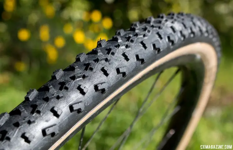 With tan sidewalls, a relatively supple 185 tpi casing and aggressive tread, riding buddies and competitors might think you're on a new handmade mud tubular. Islabikes Gréim Pro tubeless cyclocross tire. © Cyclocross Magazine