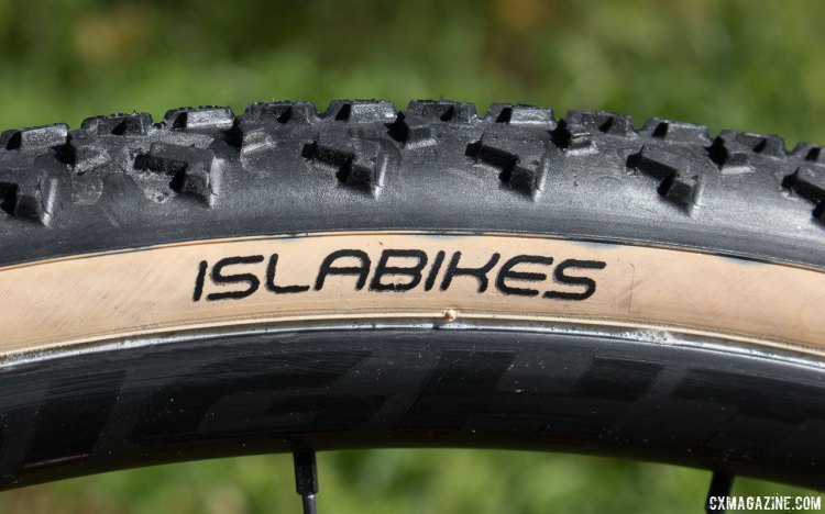 Islabikes muddies its clean, kid-friendly name with the adult-sized Gréim Pro tubeless cyclocross tire. The center knobs are the same height as the side knobs, which creates for a smooth-rolling center tread. © Cyclocross Magazine