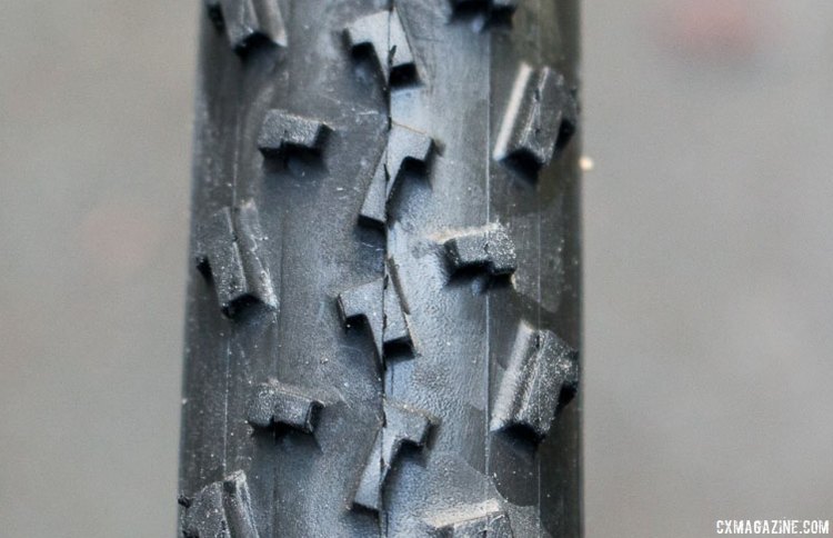 Tighter center knobs for less rolling resistance on hard surfaces, but wide spacing elsewhere for mud clearing ability. Note: one of our test tires had a bit of a minor tread alignment issue that just made for slighlty longer, tapered center knobs. Islabikes Gréim Pro tubeless cyclocross tire. © Cyclocross Magazine