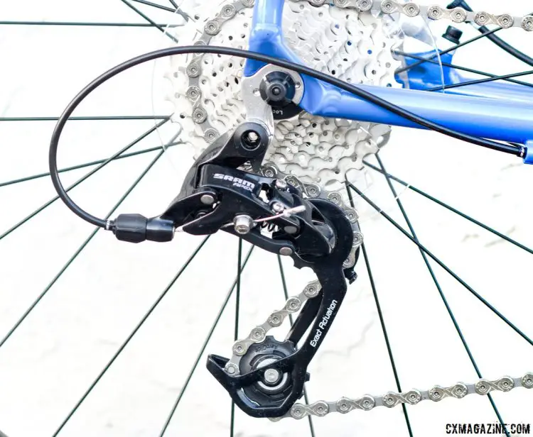 The SRAM Apex 10-speed rear derailleur is not an Apex 1 clutch-based model, but dual chainring guards keeps the chain on. Raleigh RX24 24" wheel kid's cyclocross bike. © P. Merridew / Cyclocross Magazine