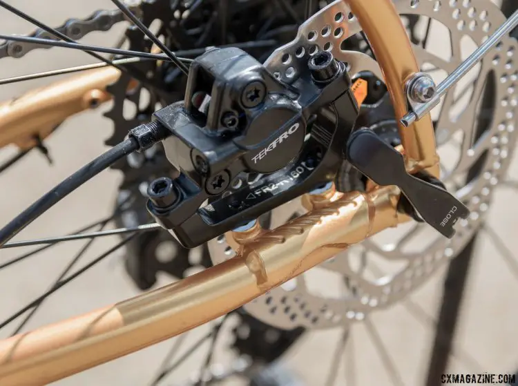 The gold Doppler Cafe model caught our eye, and caught us drooling. Tektro flat bar hydraulic brakes stopped us in our tracks. Unlike the inversion, flat mount brakes are used. 2017 Sea Otter Classic. © C. Lee / Cyclocross Magazine