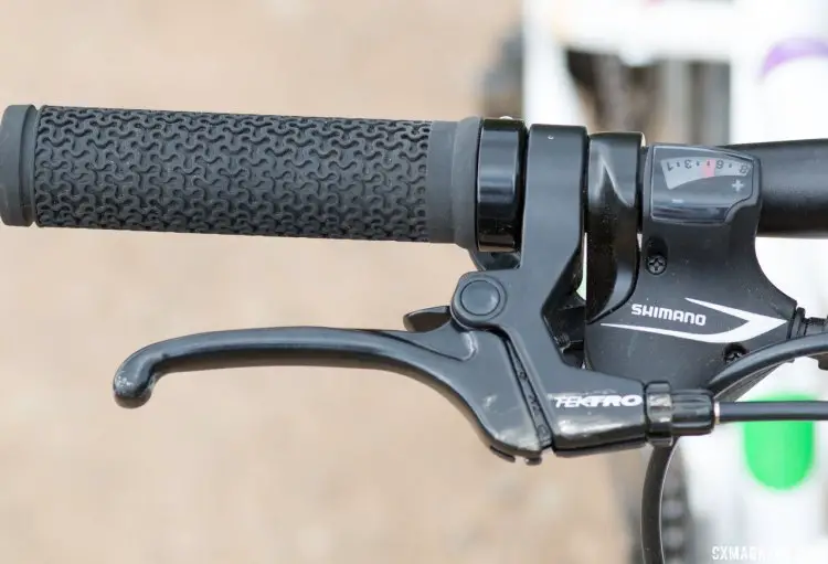 Tektro brake levers, a low-profile grip and Shimano Alivio shifters provide the controls. Frog Bikes 55 20" wheel kid's bike. © Cyclocross Magazine