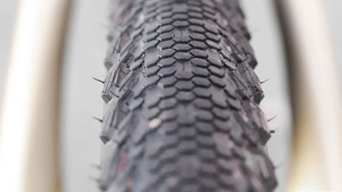 Vittoria's new 40c Terreno TNT Tubeless tires features a fish scale-like Dry conditions tire that has a smoother leading edge and a trailing edge that bites in during braking. The tread features three different knob heights, increasing in height as you move to the shoulders. 2017 Sea Otter Classic. © Cyclocross Magazine