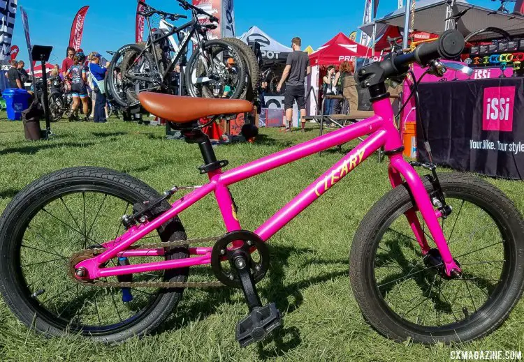 Cleary Bikes' steel kid's rides have clean, simple lines and more aggressive riding positions than the average kid's bike. The Sorta Pink color reminds us of a Stumpjumper Team but this ride features better brakes than that 1987 ride. Kids' bikes companies multiply at the 2017 Sea Otter Classic. © Justin Wages