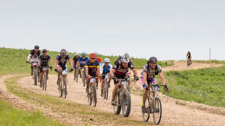 The pack of the DK200 in Chase County, Kansas. 2017 Dirty Kanza gravel race. © Christopher Nichols