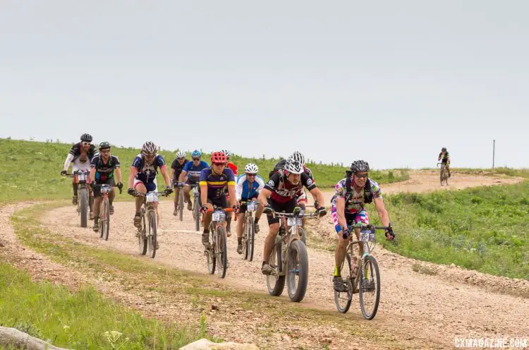 The pack of the DK200 in Chase County, Kansas. 2017 Dirty Kanza gravel race. © Christopher Nichols