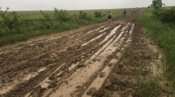 Miles and miles of muddy running can make Dirty Kanza into the world's longest cyclocross race. photo courtesy of Neil Shirley