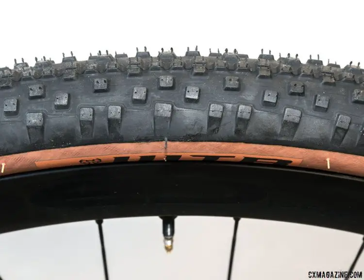 The side knobs are buttressed and tapered to avoid squirm when cornering on the road. WTB Resolute 42 gravel tire. © Cyclocross Magazine