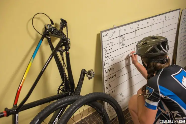 Journaling is key when you're serious about getting better, whether it's interval times, tire pressure or time to change a wheel. Montana Cross Camp, Women, 2017. © Tom Robertson