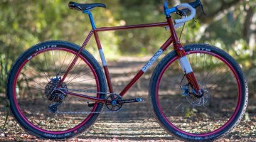 Rex Cycles' fillet brazed monster cross bike features big, 29er rubber. It's subtle, but the seat tube curves for added tire clearance. © Cyclocross Magazine