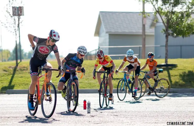 Campers work on their on-the-bike agility, including reaching down to grab their water bottles. 2017 Montana Cross Camp © Cyclocross Magazine